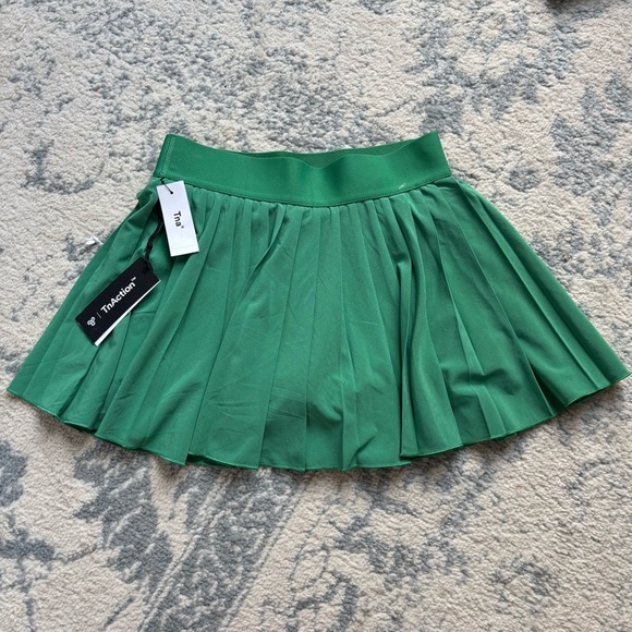 TNA Dresses & Skirts - Aritzia TNA Move Micro Tennis Skirt Green